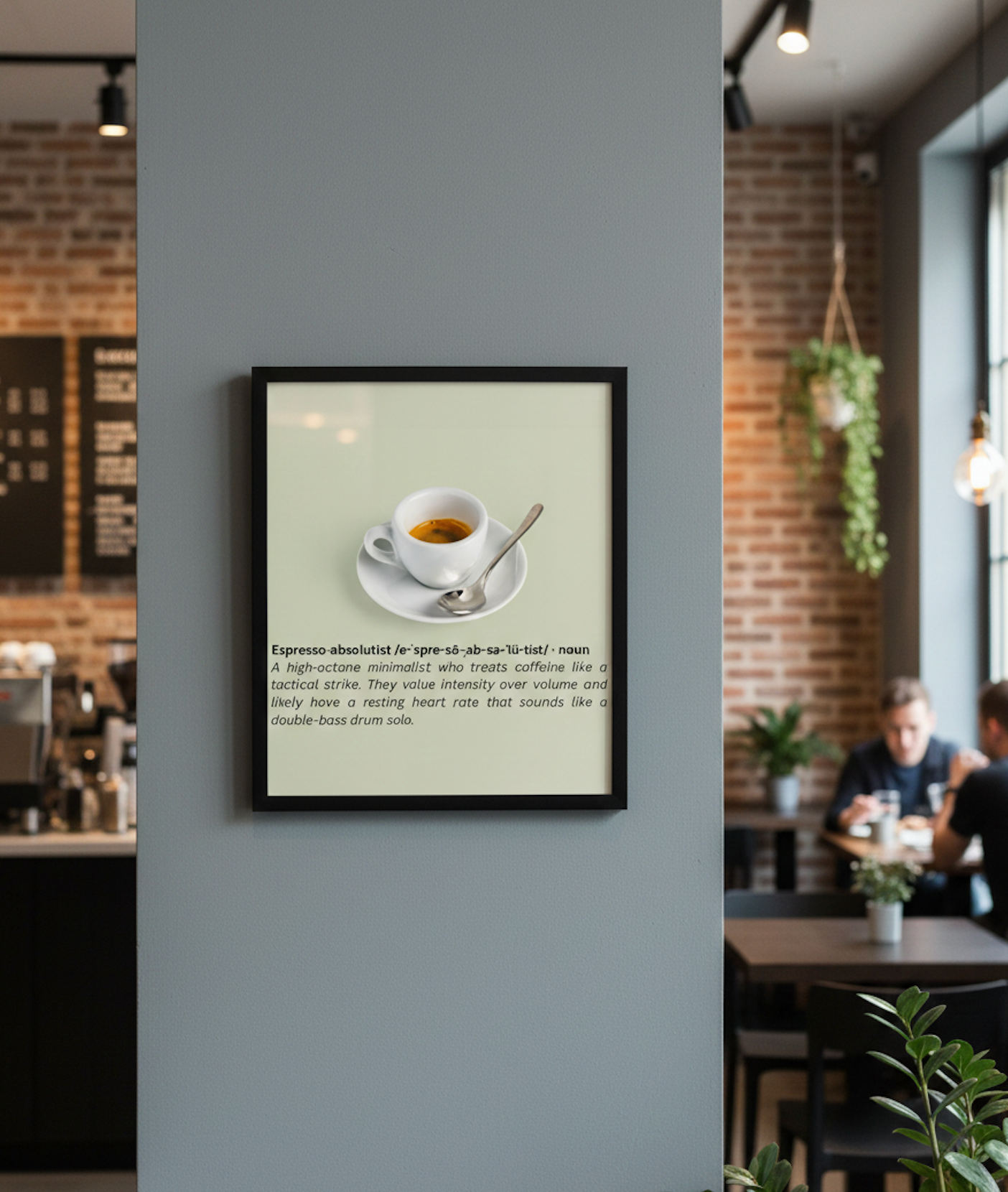 Framed picture of a coffee cup on a saucer with a spoon in a cafe setting